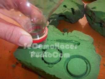 Arbol navideño con botellas
